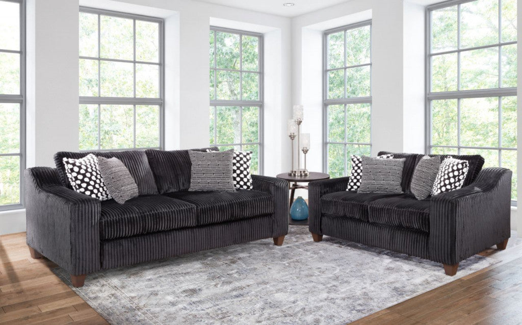 Black sofa and love seat chanel frabic